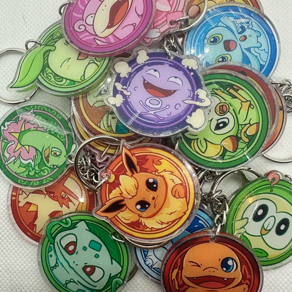 Poke Medallion Keychains - Picture 1 of 7